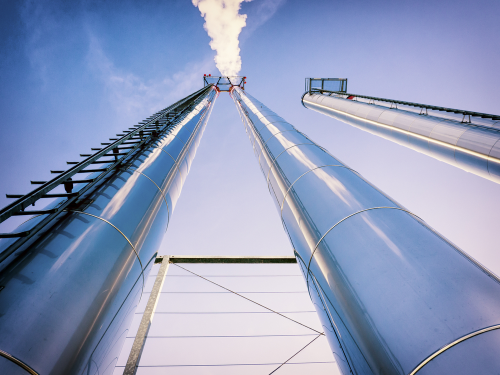 Power plant smoke stacks using combined heat and power (CHP).